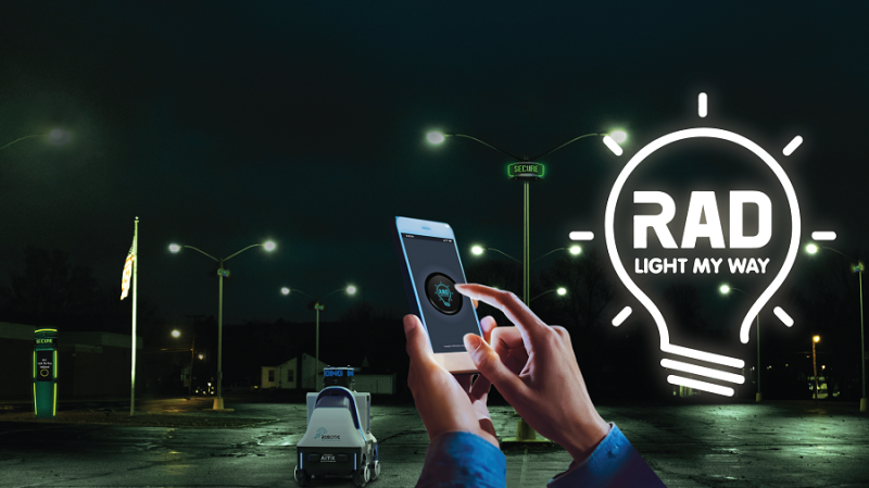 Artist's depiction of several RAD ROSA devices, one ROAMEO mobile security robot and one SCOT tower in a dark parking lot being activated by a subscriber of RAD Light My Way.